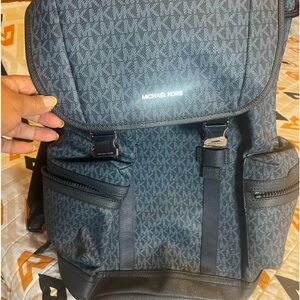 Brand New Michael Kors back pack, perfect for man and woman.